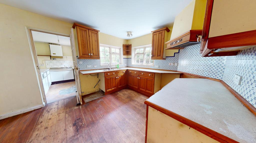 Lot: 2 - SIX-BEDROOM DETACHED HOUSE WITH APPROXIMATELY THREE ACRES OF LAND - Kitchen with access to utility room